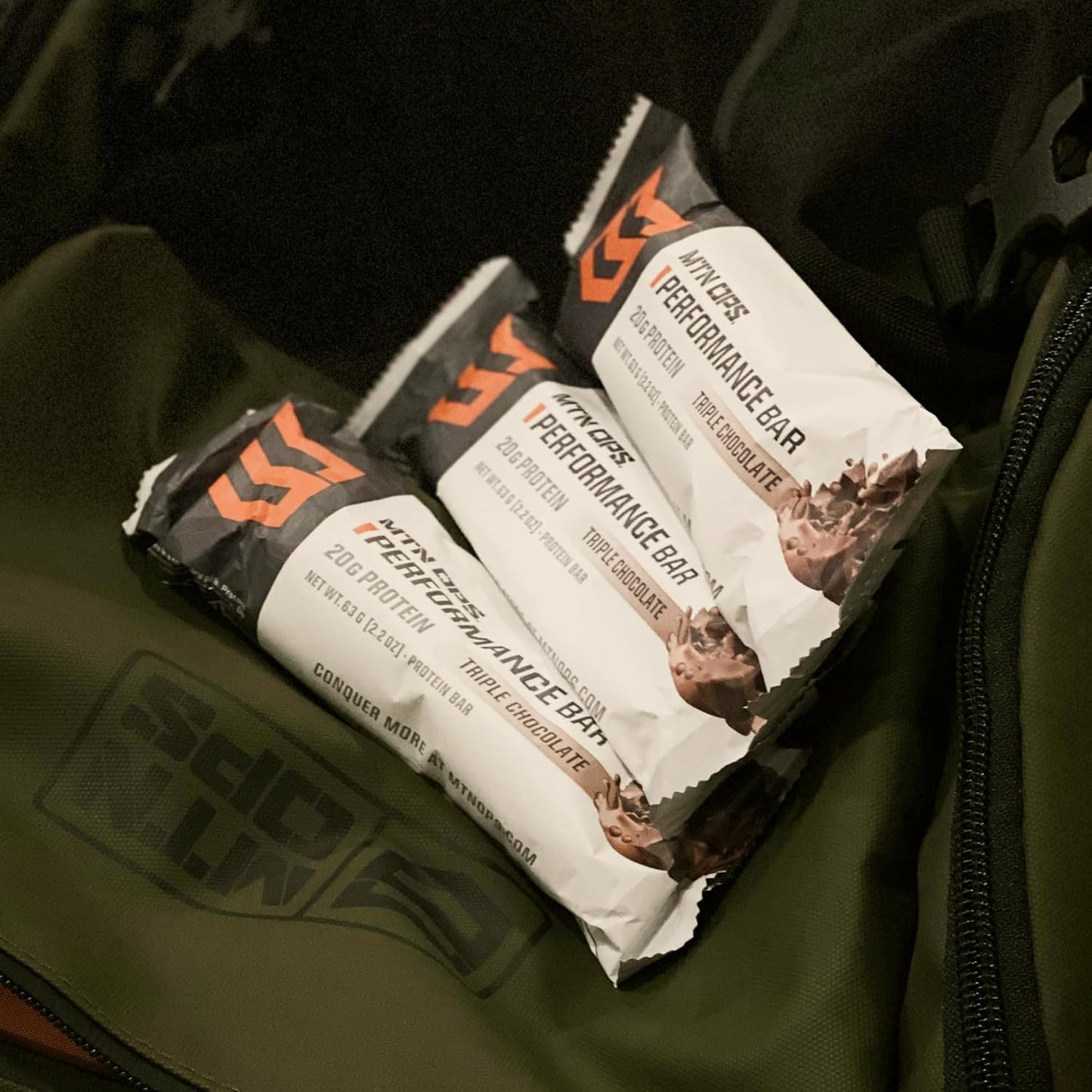 bundle-of-performance-bars-in-caramel-crunch-and-triple-chocolate-mudslide-flavors-for-a-delicious-and-energizing-snack-on-the-go-8