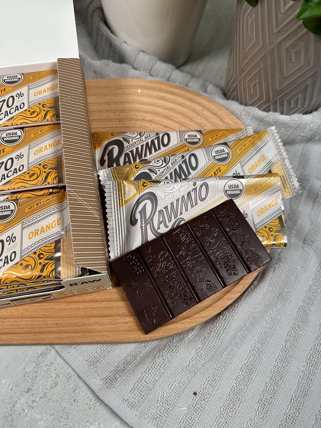 organic-raw-chocolate-bar-with-orange---70-cacao---11-oz---rawmio-essential-6
